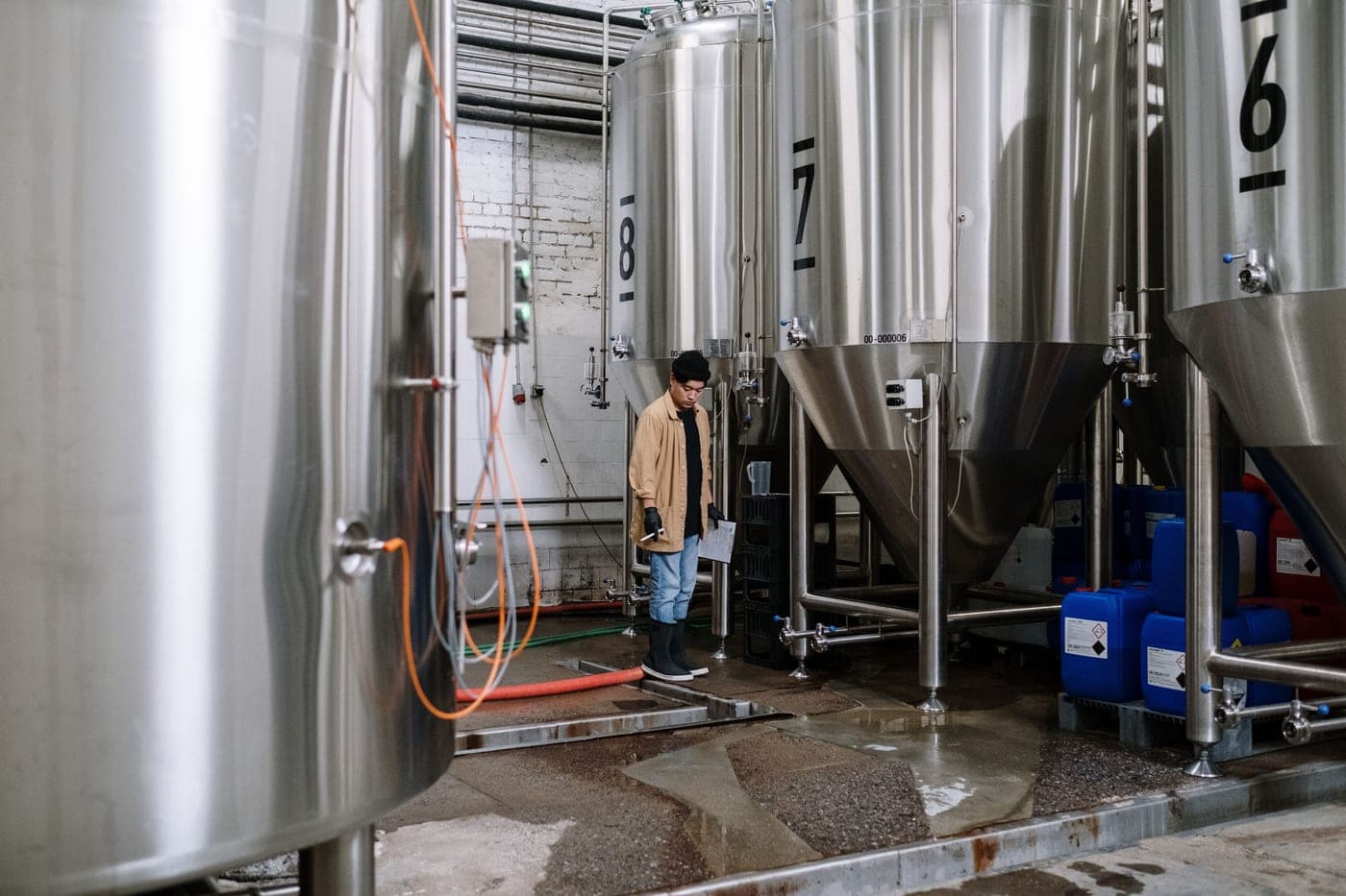 Stainless conical fermentation tank in a home brewery